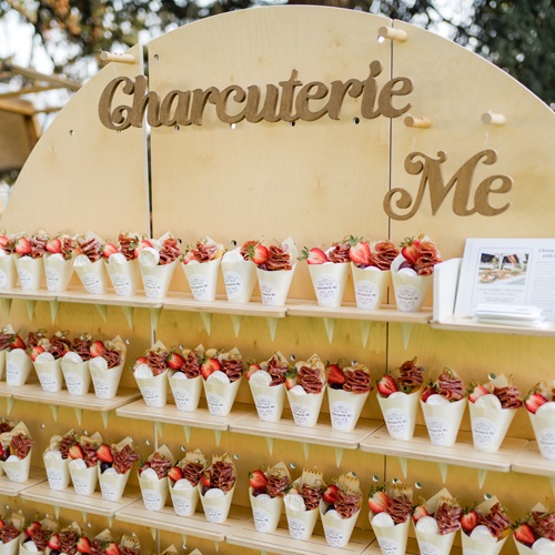 Display of charcuterie wrapped in cones